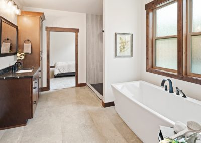 A bathroom with a tub and sink.
